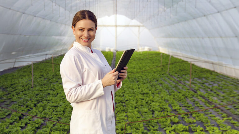 Agricultural scientist in greenhouse