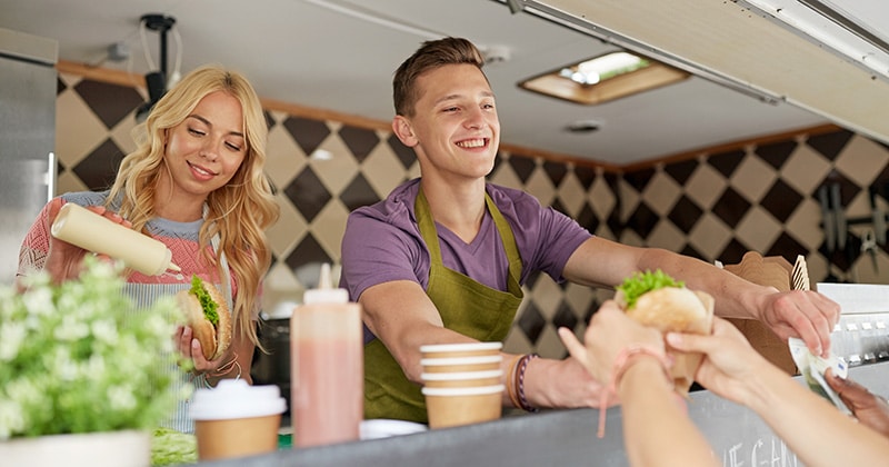 Food sellers handy healthy wraps to customers